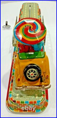 1007 RARE YELLOW MINT Marusan Tin Wind-Up Magic Wonder MG Car & Track Set-WORKS