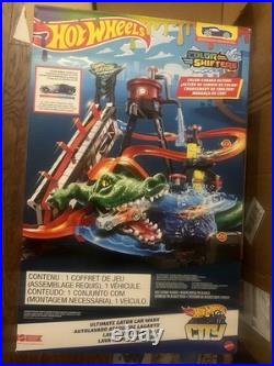 4 Hotwheels track sets+ 50 Cars+ 4-30 Car Storage Tire Cases