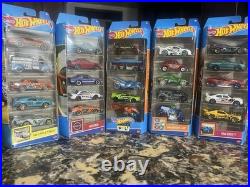 4 Hotwheels track sets+ 50 Cars+ 4-30 Car Storage Tire Cases