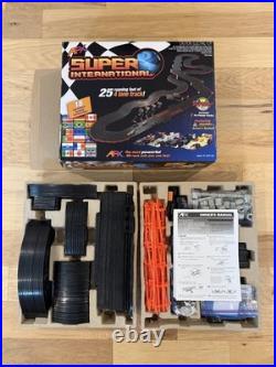 AFX Super International Mega 4 Lane Race Track Slot Cars Preowned PN 21018
