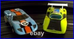 AURORA T-JET #1316 INTERNATIONAL 2 LANE HO SLOT CAR RACE TRACK SET With2 CARS AFX AURORA T-JET #1316 INTERNATIONAL 2 LANE HO SLOT CAR RACE TRACK SET With2 CARS AFX
