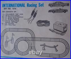 AURORA T-JET #1316 INTERNATIONAL 2 LANE HO SLOT CAR RACE TRACK SET With2 CARS AFX AURORA T-JET #1316 INTERNATIONAL 2 LANE HO SLOT CAR RACE TRACK SET With2 CARS AFX