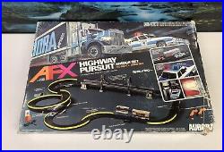 Aurora AFX Highway Pursuit Slot Car Set with Cars. 1980. Never Assembled