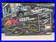 Aurora-AFX-Lited-Rig-Police-ChaseSlot-Car-Set-with-Cars-Pre-owned-01-mqij
