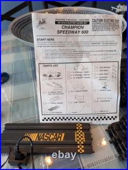 Champion speedway 600 race track set with 3 cars and extra tracks