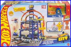 Explore the Hot Wheels Mega Loop Garage 164 Scale Cars & Helicopter Playset