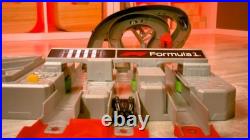 Formula 1 Grand Prix Toy Car Track Set, 3 Die-Cast Cars, Motorized Booster, 2 Ra