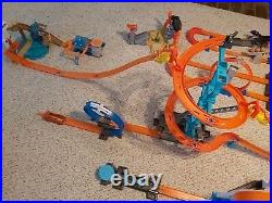 Hot Wheels 10 Sets, lots of tracks, launchers, and cars