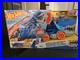 Hot-Wheels-City-Toy-Car-Track-Set-Ultimate-T-Rex-Transporter-Dinosaur-Hauler-01-qgm