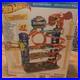 Hot-Wheels-City-Ultimate-Garage-Track-Set-with-2-Die-Cast-Toy-Cars-Car-Eating-01-crft