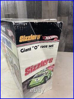 Hot Wheels Sizzlers Giant O Race Set with 1 Car Box, tracks, Juice Machine