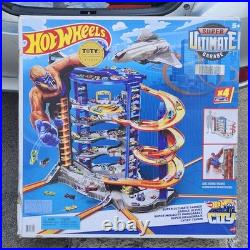 Hot Wheels Super Ultimate Garage Track Set With 4 164 Scale Cars Over 3-Feet