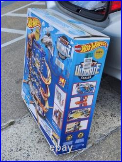 Hot Wheels Super Ultimate Garage Track Set With 4 164 Scale Cars Over 3-Feet