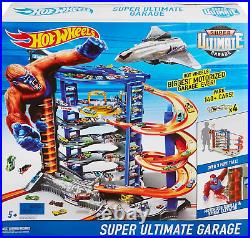 Hot Wheels Toy Car Track Set & 4 164 Scale Cars, Super Ultimate Garage, 3+ Ft