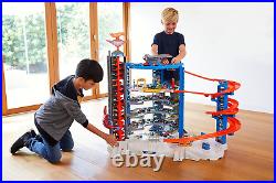 Hot Wheels Toy Car Track Set & 4 164 Scale Cars, Super Ultimate Garage, 3+ Ft