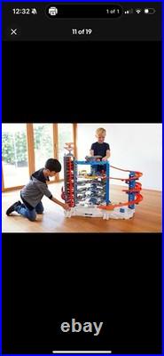 Hot Wheels Toy Car Track Set & 4 164 Scale Cars, Super Ultimate Garage, 3+ ft Hot Wheels Toy Car Track Set & 4 164 Scale Cars, Super Ultimate Garage, 3+ ft