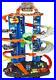 Hot-Wheels-Track-Set-and-2-Toy-Cars-City-Ultimate-Garage-Playset-01-rhqy