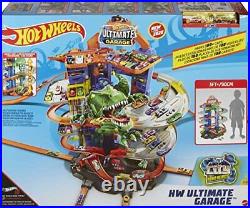 Hot Wheels Track Set and 2 Toy Cars Ultimate City Garage with Moving Dino Sto