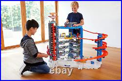 Hot Wheels Track Set with 4 164 Scale Toy Cars, over 3-Feet Tall Garage with Mo