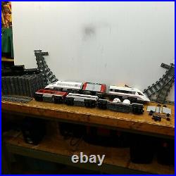 Lego city high speed bullet train, track, switches, extra cars, motor. No remote
