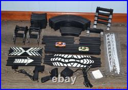 Lifelike Midnight Stunt Racers Glow-in-the-Dark HO Slot Car Race Track Set