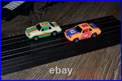 Lifelike Midnight Stunt Racers Glow-in-the-Dark HO Slot Car Race Track Set