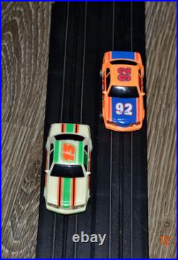 Lifelike Midnight Stunt Racers Glow-in-the-Dark HO Slot Car Race Track Set