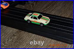 Lifelike Midnight Stunt Racers Glow-in-the-Dark HO Slot Car Race Track Set