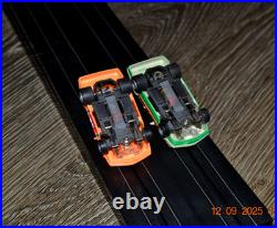 Lifelike Midnight Stunt Racers Glow-in-the-Dark HO Slot Car Race Track Set