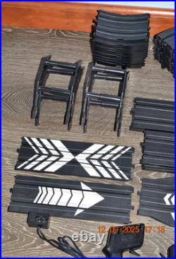 Lifelike Midnight Stunt Racers Glow-in-the-Dark HO Slot Car Race Track Set