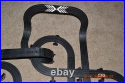 Lifelike Midnight Stunt Racers Glow-in-the-Dark HO Slot Car Race Track Set