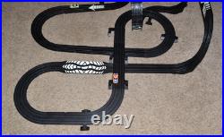 Lifelike Midnight Stunt Racers Glow-in-the-Dark HO Slot Car Race Track Set