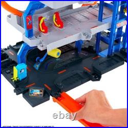 Mega Loop Garage Track Set with Toy Car & Helicopter Hot Wheels Race Playset