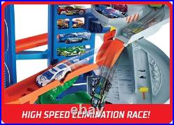 Vertical Toy Car Track Set with T-Rex & Kid-Powered Elevator 2 Cars Included Vertical Toy Car Track Set with T-Rex & Kid-Powered Elevator 2 Cars Included