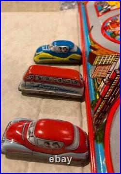 Vintage Tin toy 3 car set with track windup