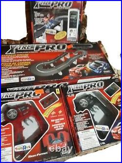 XTREK PRO SET includes 2-160 R/C cars & controllers, Race Track, & Display set