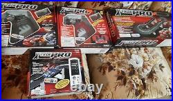 XTREK PRO SET includes 2-160 R/C cars & controllers, Race Track, & Display set