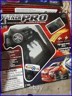 XTREK PRO SET includes 2-160 R/C cars & controllers, Race Track, & Display set