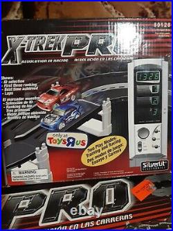 XTREK PRO SET includes 2-160 R/C cars & controllers, Race Track, & Display set